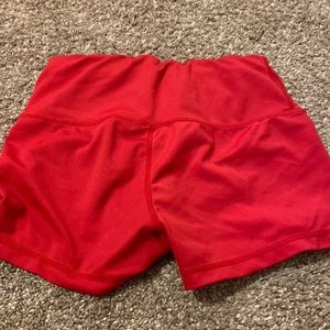 red shorts